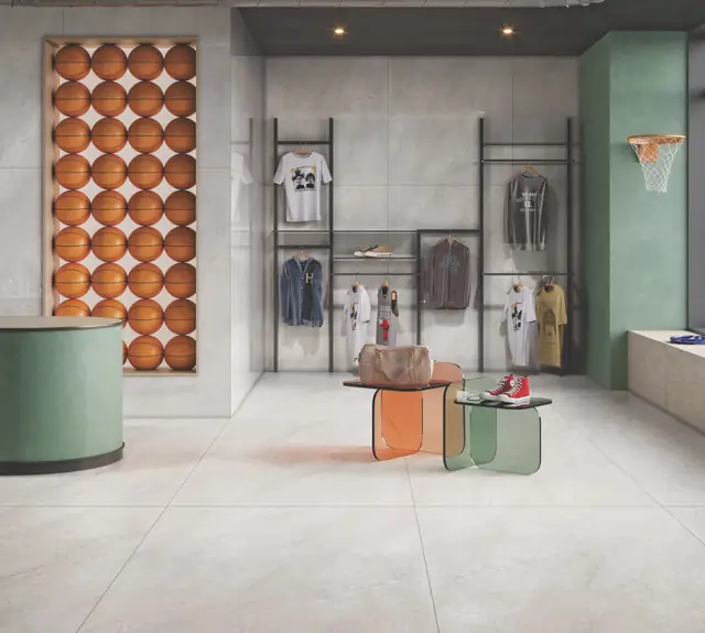 Soft Grey Marble Look Retail store with large glossy tiles