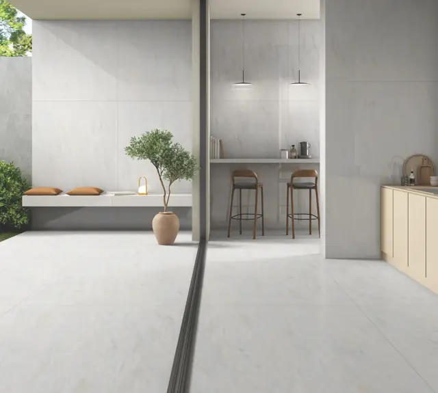 White Marble Look Open kitchen with large glossy tiles