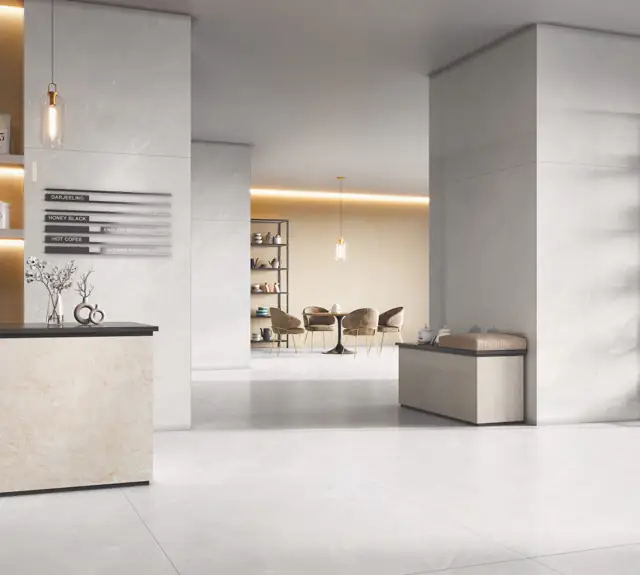 Soft Grey Marble Look Showroom with large glossy tiles